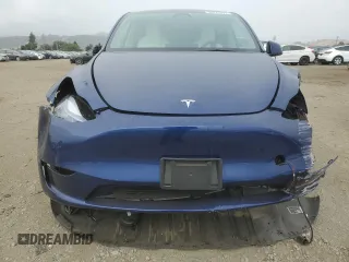 2024 Tesla Model Y with VIN 7SAYGDED3RF118546, listed as a Copart auction lot 56573375 with 4,760 mi miles and Salvage title. Bid and sale history available at DreamBid. Image 5.