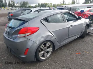 2012 Hyundai Veloster w/Gray Int z VIN KMHTC6AD9CU069416, wystawiony jako IAAI lot #42314080 z przebiegiem Nie podano mil oraz . Historia ofert i sprzedaży dostępna na DreamBid. Obrazek 4.