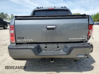 2009 Honda Ridgeline RTL z VIN 5FPYK16549B100193, wystawiony jako Copart lot #54103105 z przebiegiem 186 580 mil mil oraz Szkoda całkowita • Salvage title. Historia ofert i sprzedaży dostępna na DreamBid. Obrazek 6.