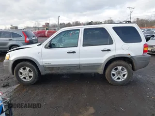 2002 Ford Escape XLT Choice with VIN 1FMYU04142KD82594, listed as a IAAI auction lot 41574646 with 173,174 mi miles. Bid and sale history available at carsss.com. Image 13.