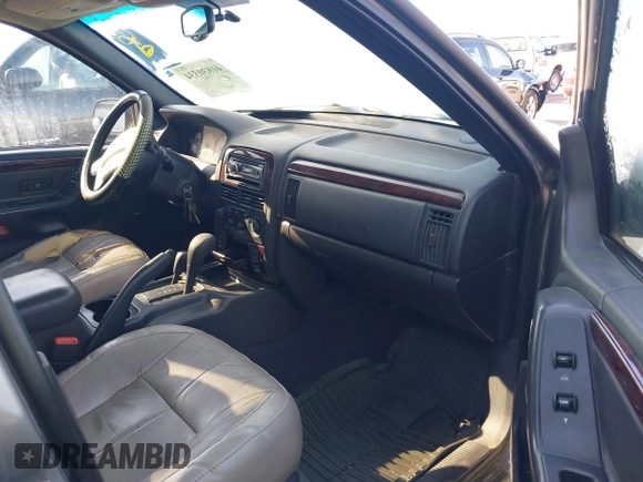 2001 Jeep Grand Cherokee Limited with VIN 1J4GW58N91C688438, listed as a IAAI auction lot 41830334 with 184,420 mi miles. Bid and sale history available at carsss.com. Image 5.