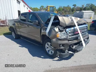 2015 GMC Canyon 2WD SLE with VIN 1GTG5BE31F1166383, listed as a IAAI auction lot 41640378 with 334,016 mi miles. Bid and sale history available at carsss.com. Image 1.
