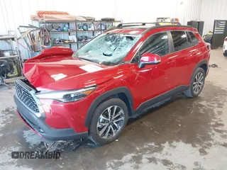 2024 Toyota Corolla Cross XLE with VIN 7MUDAABG3RV088783, listed as a IAAI auction lot 42433593 with 11,687 mi miles and . Bid and sale history available at DreamBid. Image 2.