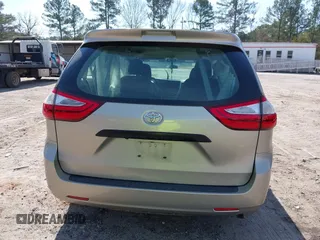 2015 Toyota Sienna L with VIN 5TDZK3DC4FS669496, listed as a IAAI auction lot 41691430 with 119,427 mi miles. Bid and sale history available at carsss.com. Image 17.