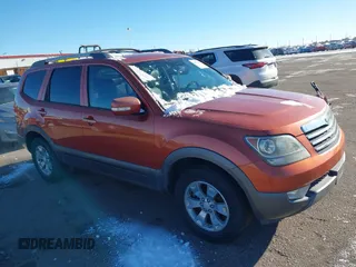 2009 Kia Borrego LX with VIN KNDJH741295034028, listed as a IAAI auction lot 41371961 with 99,785 mi miles. Bid and sale history available at carsss.com. Image 1.