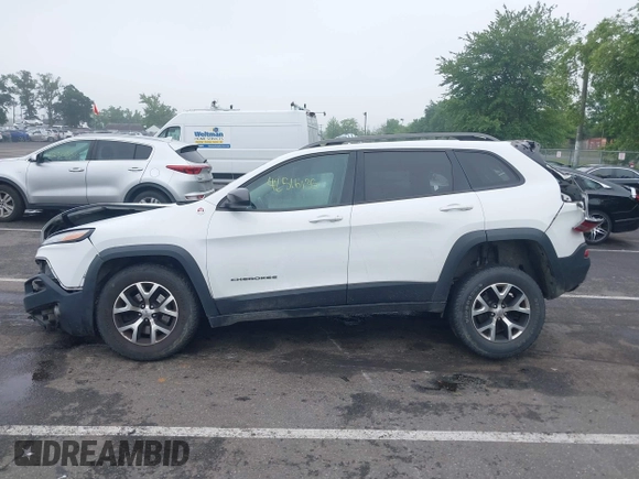 2016 Jeep Cherokee Trailhawk with VIN 1C4PJMBS4GW179121, listed as a IAAI auction lot 42516635 with 110,056 mi miles and . Bid and sale history available at DreamBid. Image 14.