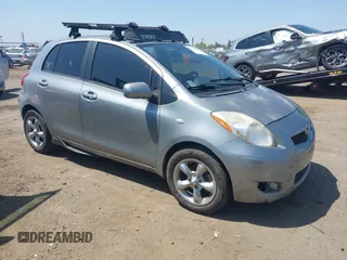 2009 Toyota Yaris with VIN JTDKT903195235991, listed as a IAAI auction lot 42164989 with 249,389 mi miles. Bid and sale history available at carsss.com. Image 1.