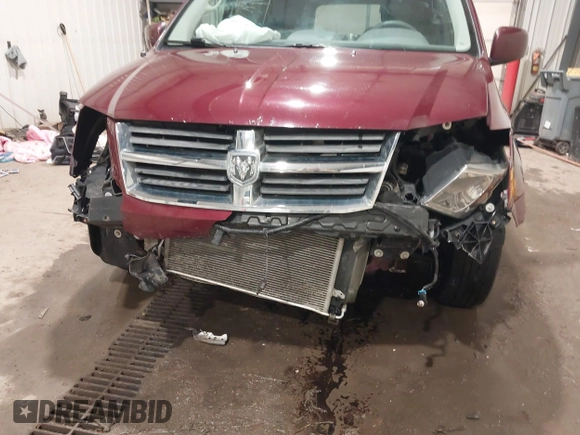 2009 Dodge Grand Caravan SXT z VIN 2D8HN54X39R551424, wystawiony jako IAAI lot #41370081 z przebiegiem 176 614 mil mil oraz . Historia ofert i sprzedaży dostępna na DreamBid. Obrazek 6.