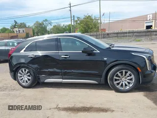 2020 Cadillac XT4 AWD Premium Luxury with VIN 1GYFZDR4XLF081159, listed as a IAAI auction lot 42337319 with 49,234 mi miles and . Bid and sale history available at DreamBid. Image 13.
