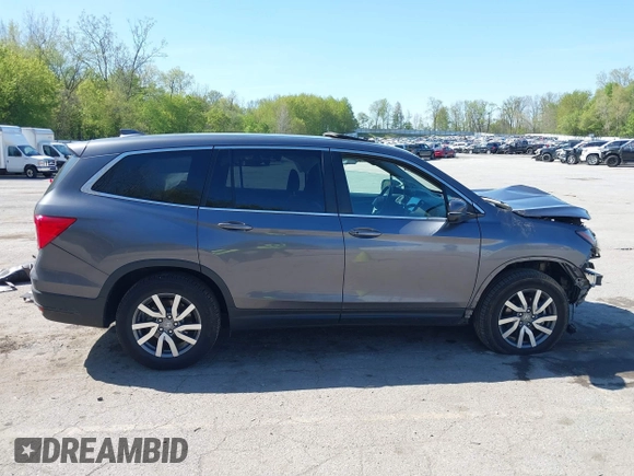 2020 Honda Pilot EX-L z VIN 5FNYF6H58LB049652, wystawiony jako IAAI lot #42213555 z przebiegiem 84 846 mil mil oraz . Historia ofert i sprzedaży dostępna na DreamBid. Obrazek 13.