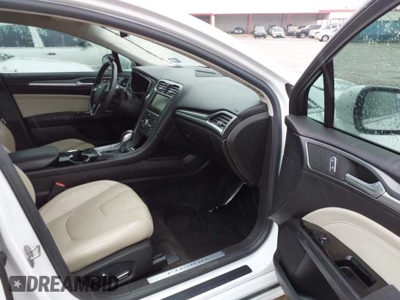 2016 Ford Fusion Titanium with VIN 3FA6P0K92GR400269, listed as a IAAI auction lot 41961043 with 191,638 mi miles and . Bid and sale history available at DreamBid. Image 5.
