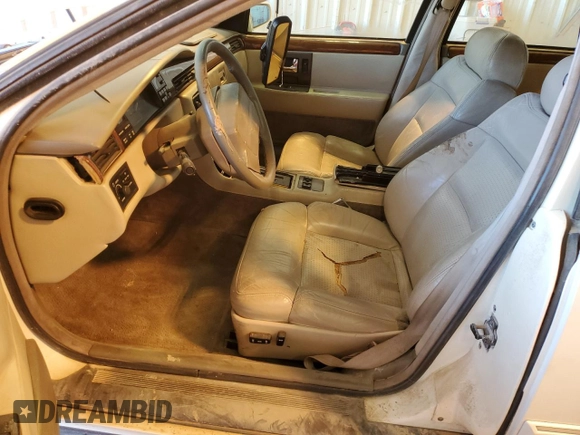 1993 Cadillac Seville Touring STS z VIN 1G6KY5295PU817593, wystawiony jako Copart lot #47807075 z przebiegiem Nie podano mil oraz Czysty tytuł • Clean title. Historia ofert i sprzedaży dostępna na DreamBid. Obrazek 7.