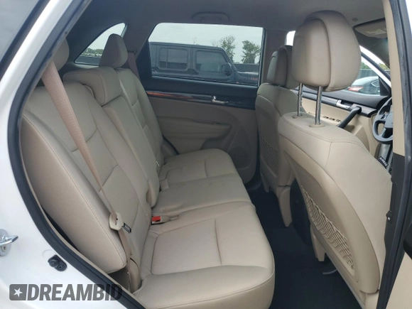 2012 Kia Sorento LX with VIN 5XYKT3A19CG219658, listed as a Copart auction lot 54078185 with 102,699 mi miles and Salvage Title. Bid and sale history available at DreamBid. Image 11.