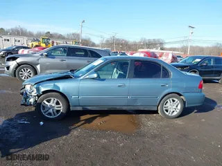 2000 Honda Civic EX with VIN 1HGEJ8649YL047194, listed as a IAAI auction lot 41526765 with 127,697 mi miles. Bid and sale history available at carsss.com. Image 14.