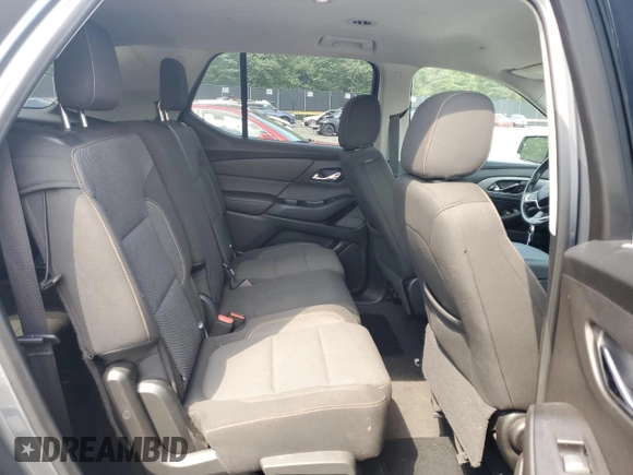 2018 Chevrolet Traverse LS with VIN 1GNERFKW9JJ276499, listed as a Copart auction lot 56007095 with 69,202 mi miles and Salvage title. Bid and sale history available at DreamBid. Image 11.