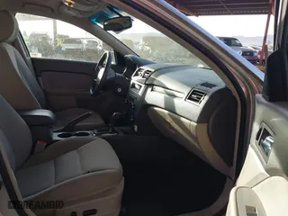 2011 Ford Fusion Hybrid with VIN 3FADP0L35BR256789, listed as a IAAI auction lot 40737584 with 133,683 mi miles. Bid and sale history available at carsss.com. Image 5.