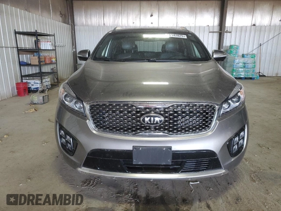 2016 Kia Sorento SXL z VIN 5XYPKDA10GG010538, wystawiony jako Copart lot #52142825 z przebiegiem 82 466 mil mil oraz Czysty tytuł • Clean title. Historia ofert i sprzedaży dostępna na DreamBid. Obrazek 5.