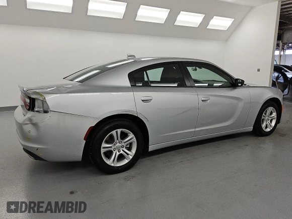 2023 Dodge Charger SXT with VIN 2C3CDXBG0PH704200, listed as a Copart auction lot 54526785 with 32,791 mi miles and Clean Title. Bid and sale history available at carsss.com. Image 3.