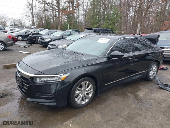 2018 Honda Accord Sedan LX 1.5T with VIN 1HGCV1F10JA182557, listed as a IAAI auction lot 41125636 with 114,760 mi miles. Bid and sale history available at carsss.com. Image 2.