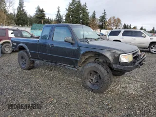 1997 Ford Ranger XLT with VIN 1FTCR15X8VPB38589, listed as a Copart auction lot 80037124 with 212,826 mi miles and Salvage Title. Bid and sale history available at DreamBid. Image 4.