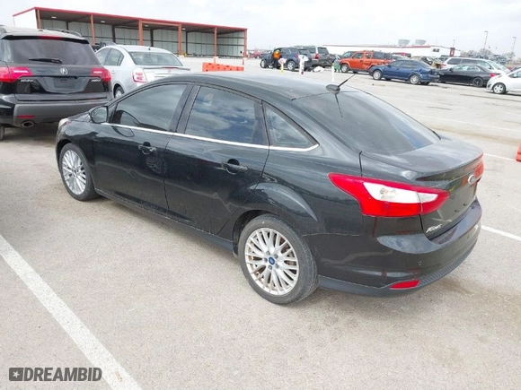 2012 Ford Focus SEL with VIN 1FAHP3H22CL284763, listed as a IAAI auction lot 41824652 with 178,451 mi miles. Bid and sale history available at carsss.com. Image 3.