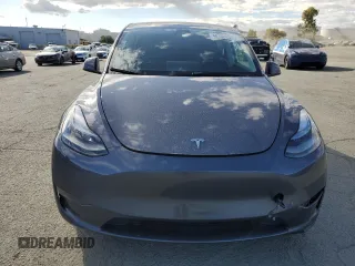 2023 Tesla Model Y Long Range with VIN 7SAYGDEE9PF638742, listed as a Copart auction lot 48188455 with 30,550 mi miles and Salvage Title. Bid and sale history available at DreamBid. Image 5.