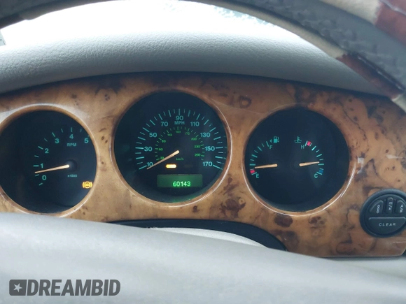 1998 Jaguar XJ with VIN SAJHN1242WC819689, listed as a IAAI auction lot 41148530 with 60,143 mi miles and . Bid and sale history available at DreamBid. Image 7.