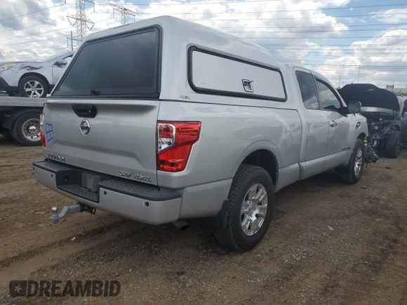 2017 Nissan Titan SV с VIN 1N6AA1C5XHN569612, выставлен на аукционе Copart как лот 58934945 с пробегом 65 995 миль миль и Списание • Salvage title. История ставок и продаж доступна на DreamBid. Изображение 3.