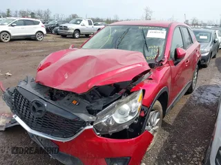 2014 Mazda CX-5 Touring with VIN JM3KE2CY4E0411780, listed as a IAAI auction lot 41903570 with 103,658 mi miles and . Bid and sale history available at DreamBid. Image 17.