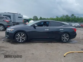 2017 Nissan Maxima SV z VIN 1N4AA6AP1HC364881, wystawiony jako IAAI lot #42251177 z przebiegiem 148 210 mil mil oraz . Historia ofert i sprzedaży dostępna na DreamBid. Obrazek 14.