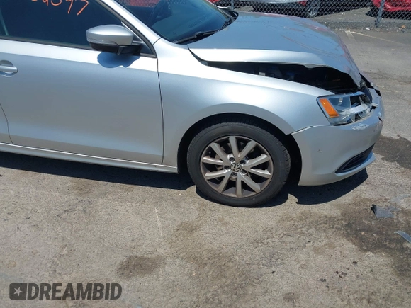 2012 Volkswagen Jetta SE with VIN 3VWDP7AJ8CM465069, listed as a IAAI auction lot 42202597 with 106,963 mi miles and . Bid and sale history available at DreamBid. Image 13.