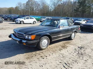 1986 Mercedes-Benz 560 Series 560SL with VIN WDBBA48D2GA055024, listed as a IAAI auction lot 41888928 with 118,569 mi miles. Bid and sale history available at carsss.com. Image 2.