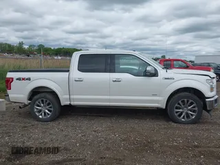 2017 Ford F-150 XL z VIN 1FTEW1EG2HFB88870, wystawiony jako IAAI lot #42336104 z przebiegiem 92 794 mil mil oraz . Historia ofert i sprzedaży dostępna na DreamBid. Obrazek 13.