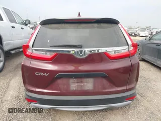 2017 Honda CR-V LX z VIN 7FARW5H3XHE004107, wystawiony jako IAAI lot #42260655 z przebiegiem 92 554 mil mil oraz . Historia ofert i sprzedaży dostępna na DreamBid. Obrazek 16.