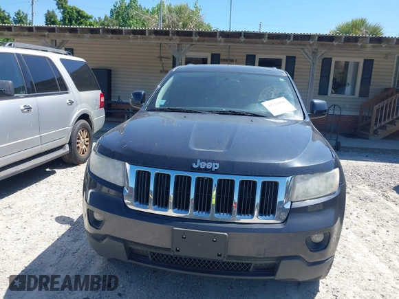 2012 Jeep Grand Cherokee Laredo with VIN 1C4RJEAG9CC223167, listed as a IAAI auction lot 42136098 with 152,715 mi miles. Bid and sale history available at carsss.com. Image 12.