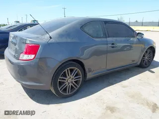 2011 Scion tC with VIN JTKJF5C72B3015652, listed as a IAAI auction lot 42087995 with 175,768 mi miles. Bid and sale history available at carsss.com. Image 4.