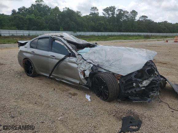 2019 BMW M5 with VIN WBSJF0C57KB447306, listed as a Copart auction lot 71837424 with 0 mi miles and Salvage Title. Bid and sale history available at carsss.com. Image 4.
