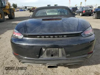 2017 Porsche 718 Boxster z VIN WP0CA2A86HS221743, wystawiony jako Copart lot #72534092 z przebiegiem 52 236 mil mil oraz . Historia ofert i sprzedaży dostępna na DreamBid. Obrazek 6.