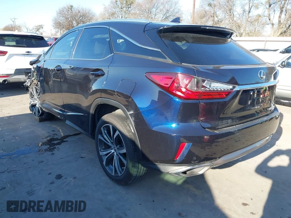 2018 Lexus RX with VIN 2T2ZZMCA2JC110964, listed as a IAAI auction lot 41142683 with 68,667 mi miles. Bid and sale history available at carsss.com. Image 3.