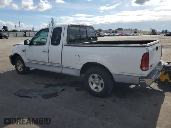 2000 Ford F-150 XL with VIN 1FTRX17W2YNB05575, listed as a Copart auction lot 86606934 with 0 mi miles and Salvage Title. Bid and sale history available at carsss.com. Image 2.