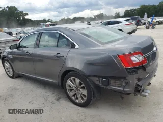 2011 Ford Taurus Limited with VIN 1FAHP2FW3BG184887, listed as a Copart auction lot 60717875 with 196,102 mi miles and Salvage title. Bid and sale history available at DreamBid. Image 2.