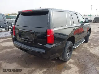 2018 Chevrolet Tahoe Commercial with VIN 1GNLCDEC0JR291831, listed as a IAAI auction lot 40681194 with 111,711 mi miles. Bid and sale history available at carsss.com. Image 4.