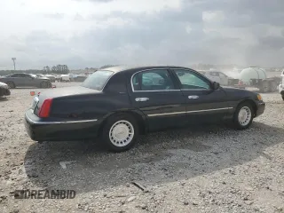 2001 Lincoln Town Car Executive z VIN 1LNHM81W11Y647756, wystawiony jako Copart lot #54741135 z przebiegiem 191 580 mil mil oraz Szkoda całkowita • Salvage title. Historia ofert i sprzedaży dostępna na DreamBid. Obrazek 3.