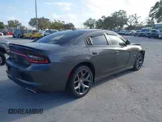 2015 Dodge Charger RT with VIN 2C3CDXCT9FH819971, listed as a IAAI auction lot 40592010 with 154,386 mi miles and . Bid and sale history available at DreamBid. Image 4.