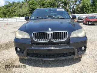 2012 BMW X5 35i with VIN 5UXZV4C54CL744502, listed as a Copart auction lot 57828115 with 161,597 mi miles and Clean title. Bid and sale history available at DreamBid. Image 5.
