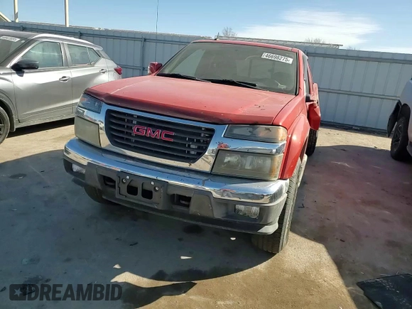 2009 GMC Canyon Work Truck z VIN 1GTDT19EX98142609, wystawiony jako Copart lot #46698275 z przebiegiem 74 910 mil mil oraz Szkoda całkowita • Salvage title. Historia ofert i sprzedaży dostępna na DreamBid. Obrazek 11.