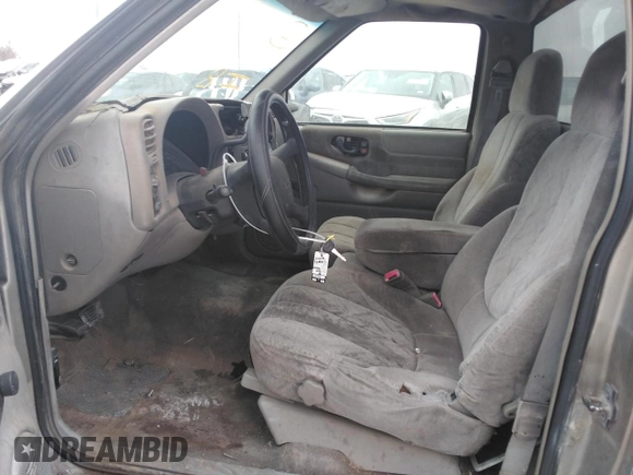 1999 GMC Sonoma with VIN 1GTCS1445X8532690, listed as a Copart auction lot 49197265 with Not Provided miles and Salvage Title. Bid and sale history available at DreamBid. Image 7.
