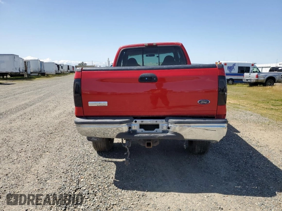 1999 Ford F-250 XL with VIN 1FTNX21S2XED58694, listed as a Copart auction lot 51462255 with 178,574 mi miles and Salvage title. Bid and sale history available at DreamBid. Image 6.