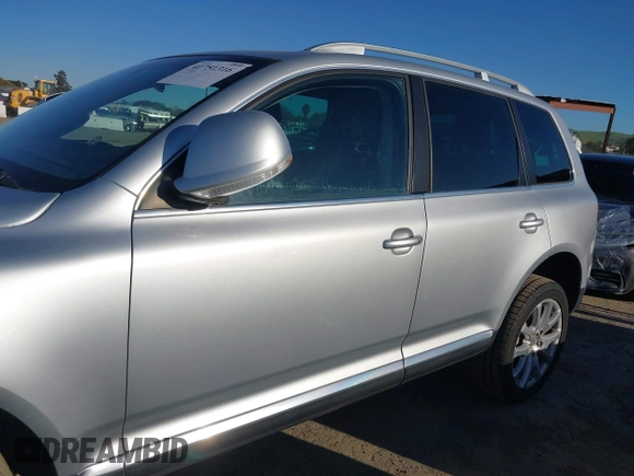 2010 Volkswagen Touareg VR6 with VIN WVGBF7A92AD001704, listed as a IAAI auction lot 41751316 with 80,597 mi miles and . Bid and sale history available at DreamBid. Image 14.