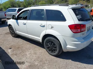2017 Dodge Journey SE with VIN 3C4PDCAB5HT569154, listed as a IAAI auction lot 41891552 with 126,861 mi miles and . Bid and sale history available at DreamBid. Image 3.